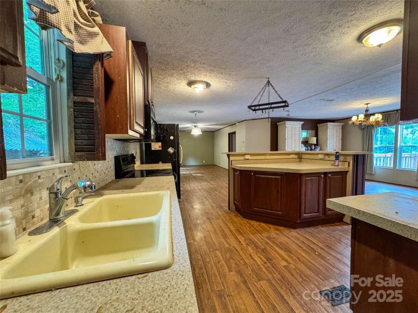 6 Dirt Road, Sylva, NC 28779.  MLS# CAR4283607, YatesRealty ID 28893. 