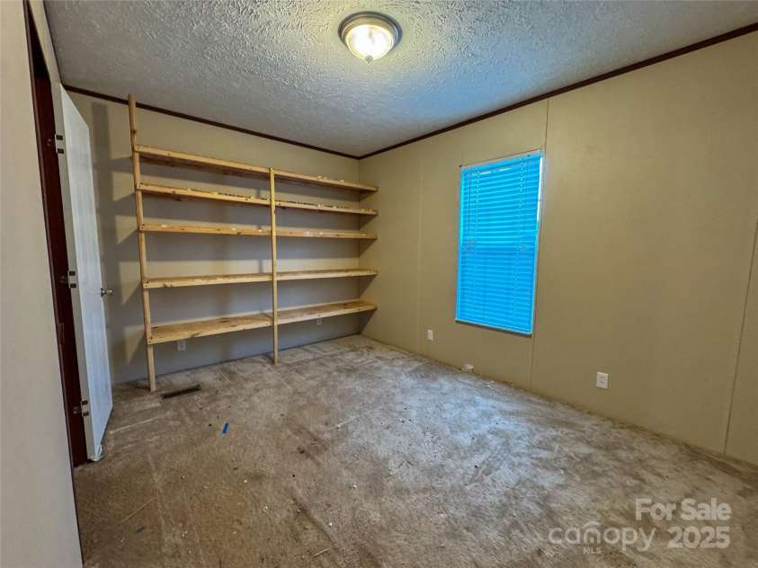 6 Dirt Road, Sylva, NC 28779.  MLS# CAR4283607, YatesRealty ID 28893. 