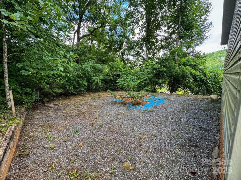 6 Dirt Road, Sylva, NC 28779.  MLS# CAR4283607, YatesRealty ID 28893. 