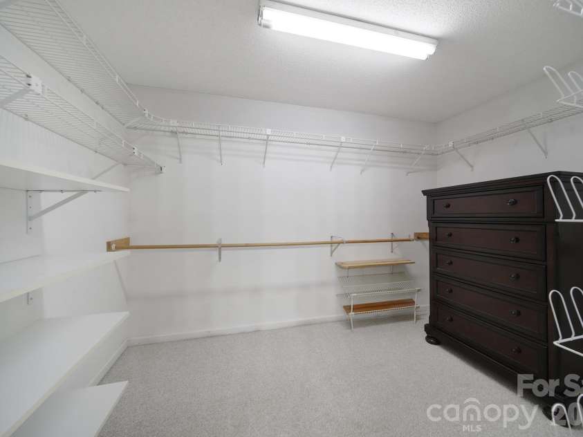 26037 Windjammer Drive, Tega Cay, SC 29708.  MLS# CAR4381208, YatesRealty ID 28897. Primary closet