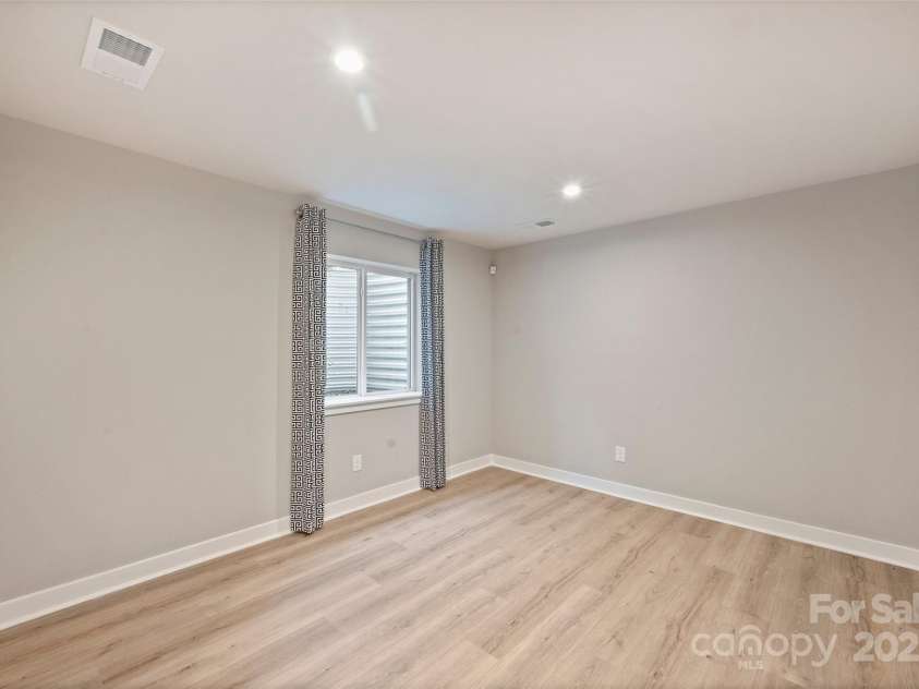 342 Cramerton Mills Parkway, Cramerton, NC 28032.  MLS# CAR4279503, YatesRealty ID 28898. Basement Den