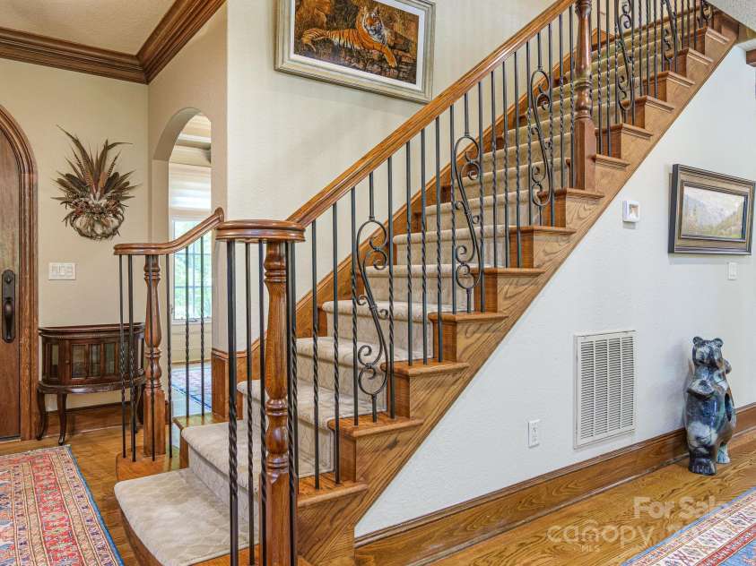 176 Valley Springs Road, Asheville, NC 28803.  MLS# CAR4277754, YatesRealty ID 2890. Main Staircase
