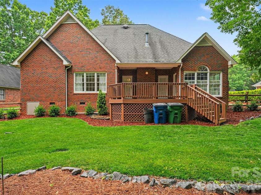 1320 Mill Race Lane, Matthews, NC 28104.  MLS# CAR4384297, YatesRealty ID 28900. Back Exterior