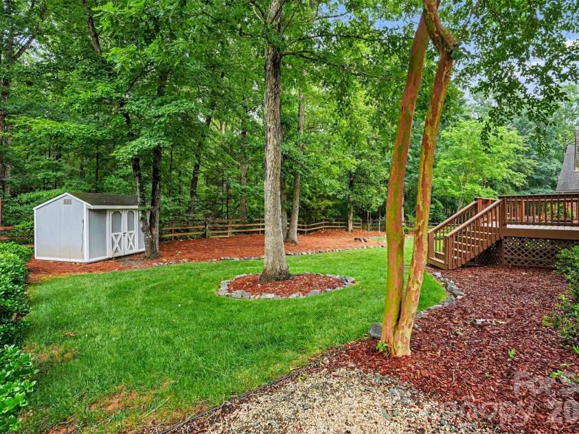 1320 Mill Race Lane, Matthews, NC 28104.  MLS# CAR4384297, YatesRealty ID 28900. Backyard w/ storage sheed