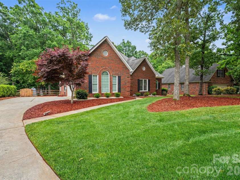 1320 Mill Race Lane, Matthews, NC 28104.  MLS# CAR4384297, YatesRealty ID 28900. Front Exterior