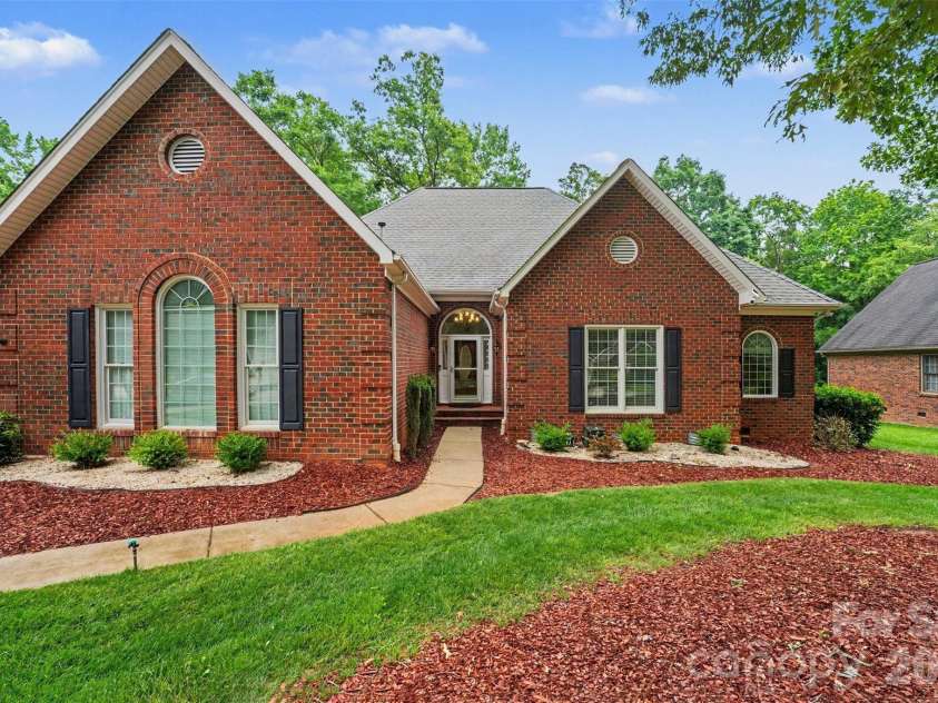 1320 Mill Race Lane, Matthews, NC 28104.  MLS# CAR4384297, YatesRealty ID 28900. Front Exterior