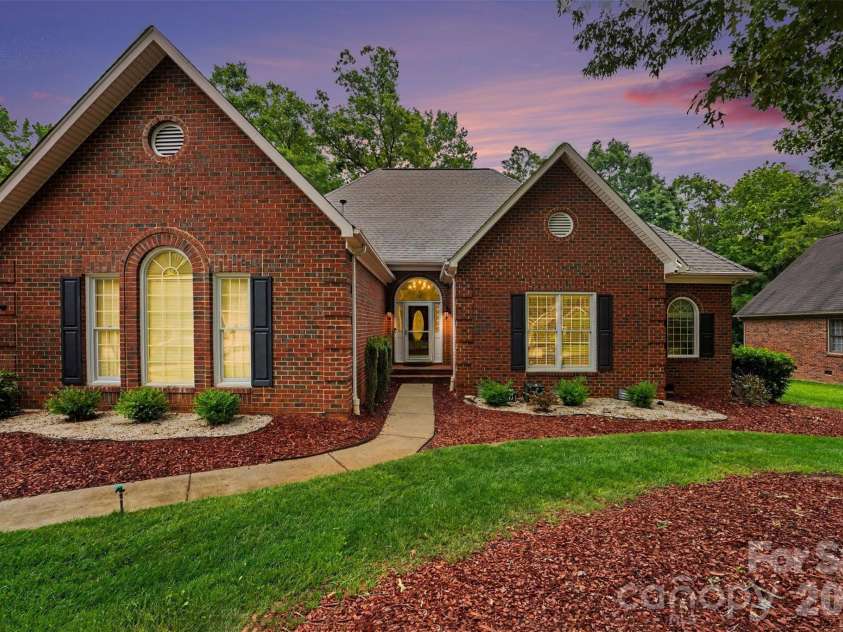 1320 Mill Race Lane, Matthews, NC 28104.  MLS# CAR4384297, YatesRealty ID 28900. Front Exterior