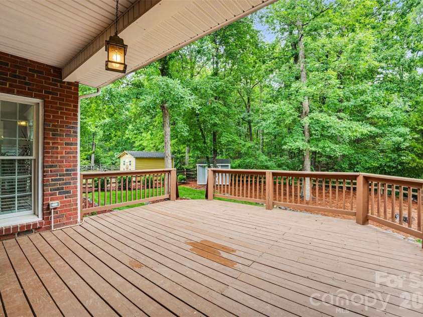 1320 Mill Race Lane, Matthews, NC 28104.  MLS# CAR4384297, YatesRealty ID 28900. Spacious Back Deck