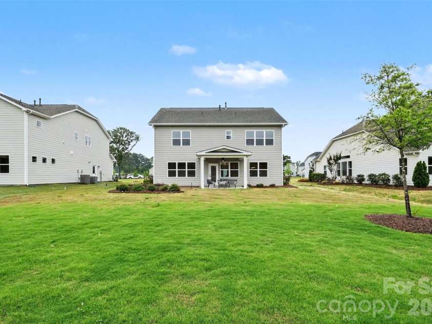 3808 Dahlia Drive, Harrisburg, NC 28075.  MLS# CAR4385206, YatesRealty ID 28902. Backyard