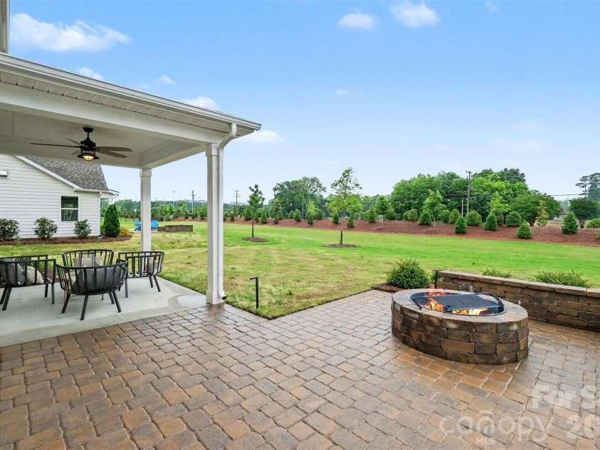 3808 Dahlia Drive, Harrisburg, NC 28075.  MLS# CAR4385206, YatesRealty ID 28902. Firepit