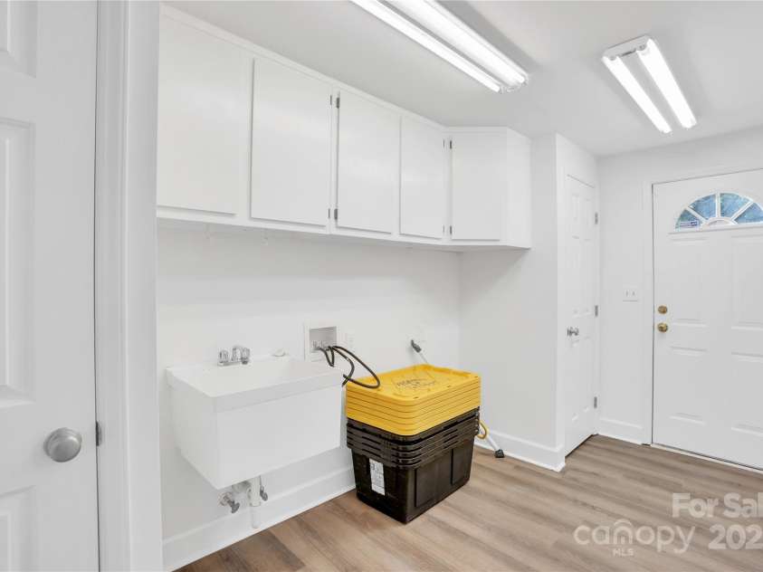 9826 Meringue Place, Charlotte, NC 28270.  MLS# CAR4260657, YatesRealty ID 28904. Laundry room with exterior access