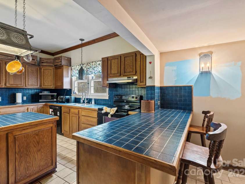 3809 Union Hill Road, East Bend, NC 27018.  MLS# CAR4276532, YatesRealty ID 28908. Kitchen with breakfast area