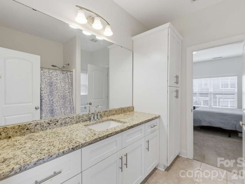 2176 Moss Meadow Lane, Denver, NC 28037.  MLS# CAR4387081, YatesRealty ID 28909. Large cabinet space in the second full bath