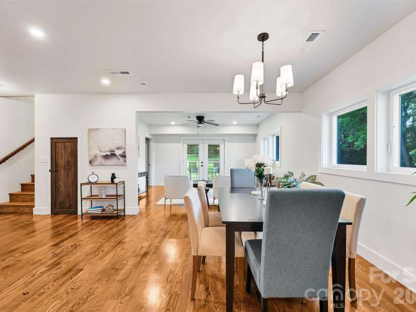 142 Gillespie Circle, Brevard, NC 28712.  MLS# CAR4273083, YatesRealty ID 2891. Main Level Dining Area Looking Towards Back Yard