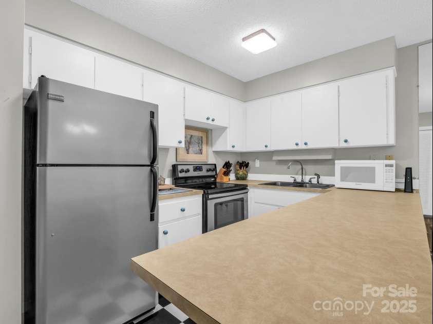 140 West Lake Drive, Lake Lure, NC 28746.  MLS# CAR4281158, YatesRealty ID 28916. 