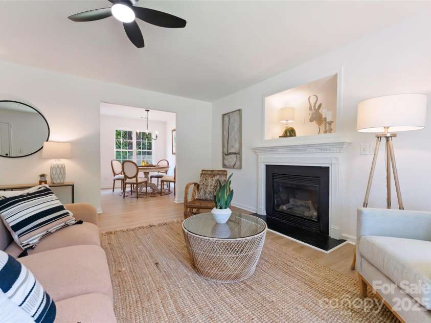 5229 Tarrywood Lane, Charlotte, NC 28205.  MLS# CAR4268771, YatesRealty ID 28922. Cozy living room with gas fireplace.