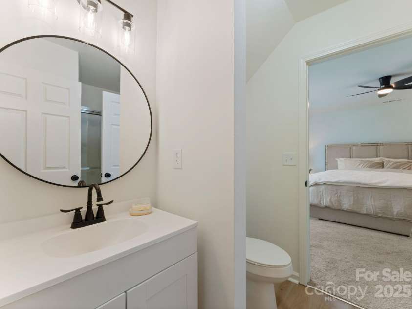 5229 Tarrywood Lane, Charlotte, NC 28205.  MLS# CAR4268771, YatesRealty ID 28922. Full bathroom connected to bedroom on main level.