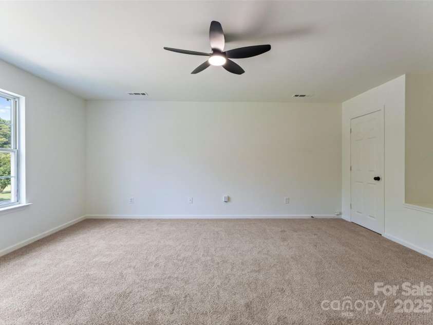 5229 Tarrywood Lane, Charlotte, NC 28205.  MLS# CAR4268771, YatesRealty ID 28922. Large third bedroom with 2 closets.