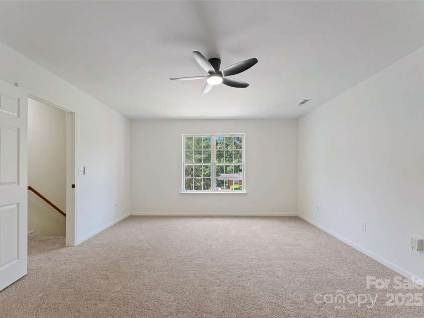 5229 Tarrywood Lane, Charlotte, NC 28205.  MLS# CAR4268771, YatesRealty ID 28922. Large third bedroom with 2 closets.