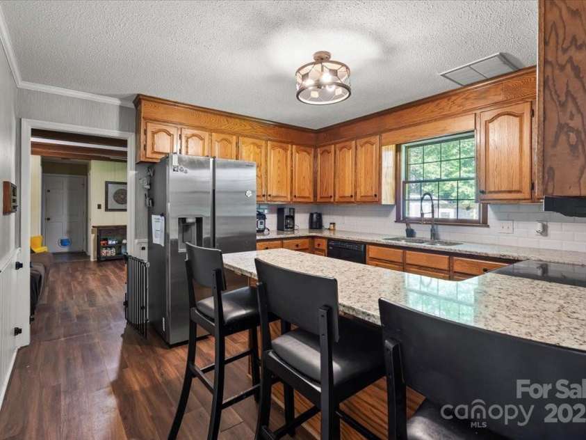 2701 Castes Drive, Pfafftown, NC 27040.  MLS# CAR4258315, YatesRealty ID 28923. 