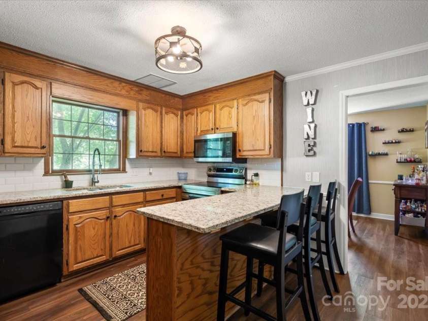 2701 Castes Drive, Pfafftown, NC 27040.  MLS# CAR4258315, YatesRealty ID 28923. 