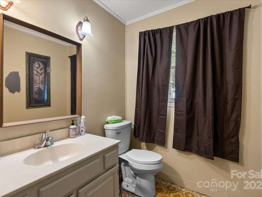 2701 Castes Drive, Pfafftown, NC 27040.  MLS# CAR4258315, YatesRealty ID 28923. 