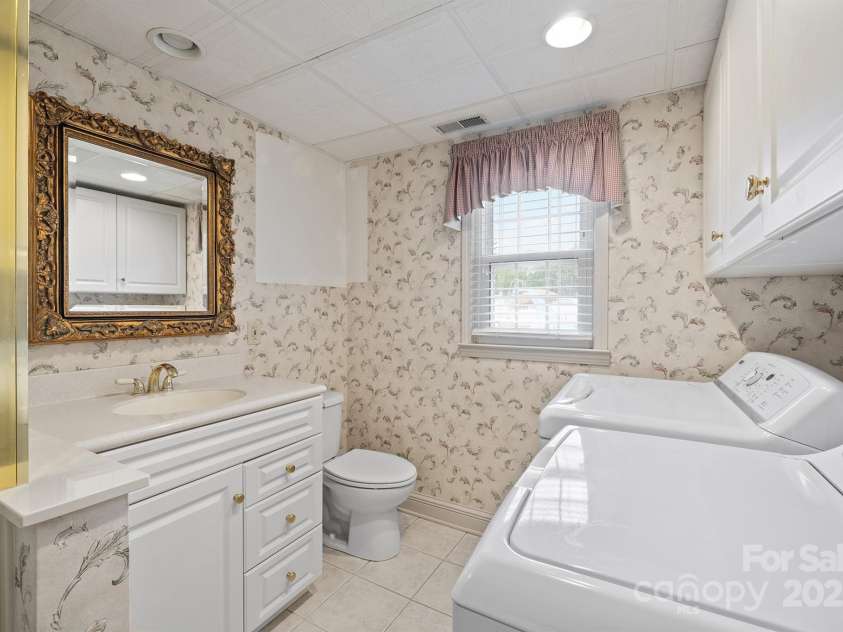 414 2nd Street, Faith, NC 28146.  MLS# CAR4283856, YatesRealty ID 28936. Lower Level Bath