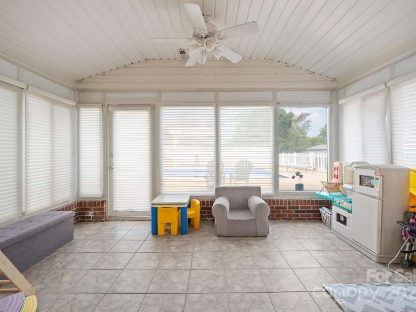 414 2nd Street, Faith, NC 28146.  MLS# CAR4283856, YatesRealty ID 28936. Lower Level Sunroom