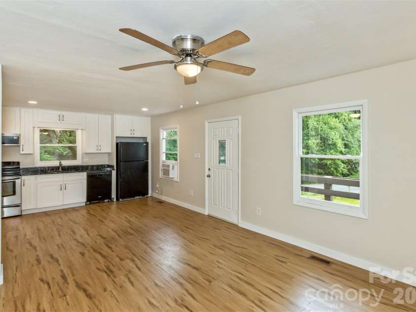 47 Fir Circle, Canton, NC 28716.  MLS# CAR4385612, YatesRealty ID 28936. Kitchen and living room