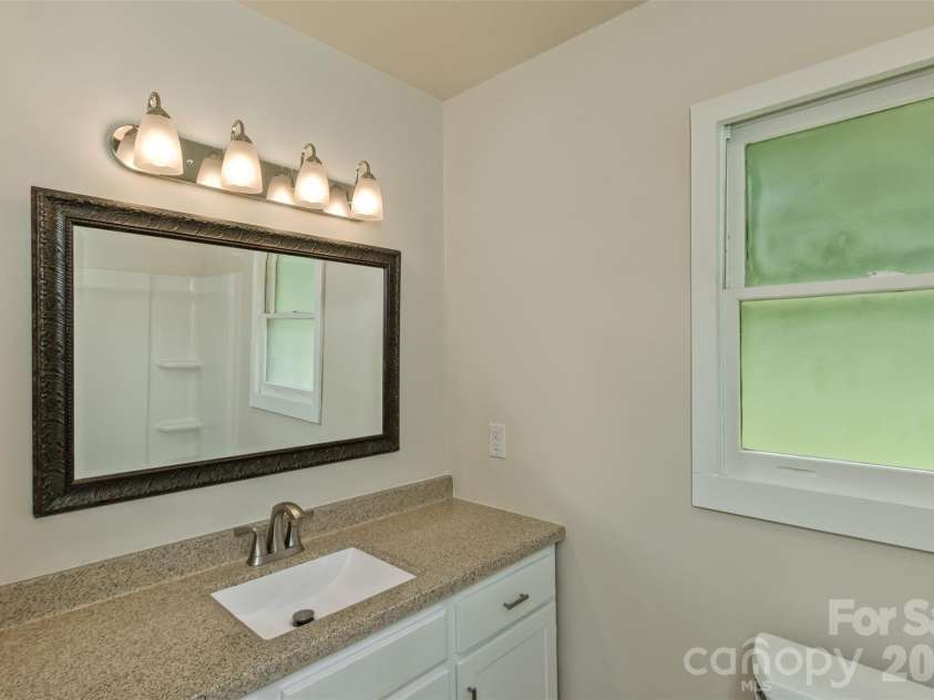 47 Fir Circle, Canton, NC 28716.  MLS# CAR4385612, YatesRealty ID 28936. Main level bathroom