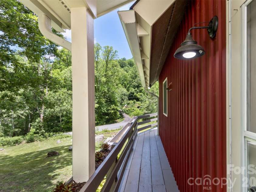 47 Fir Circle, Canton, NC 28716.  MLS# CAR4385612, YatesRealty ID 28936. Side porch