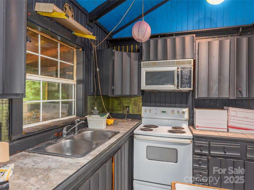 221 John Tate Drive, Fletcher, NC 28732.  MLS# CAR4285398, YatesRealty ID 28937. 