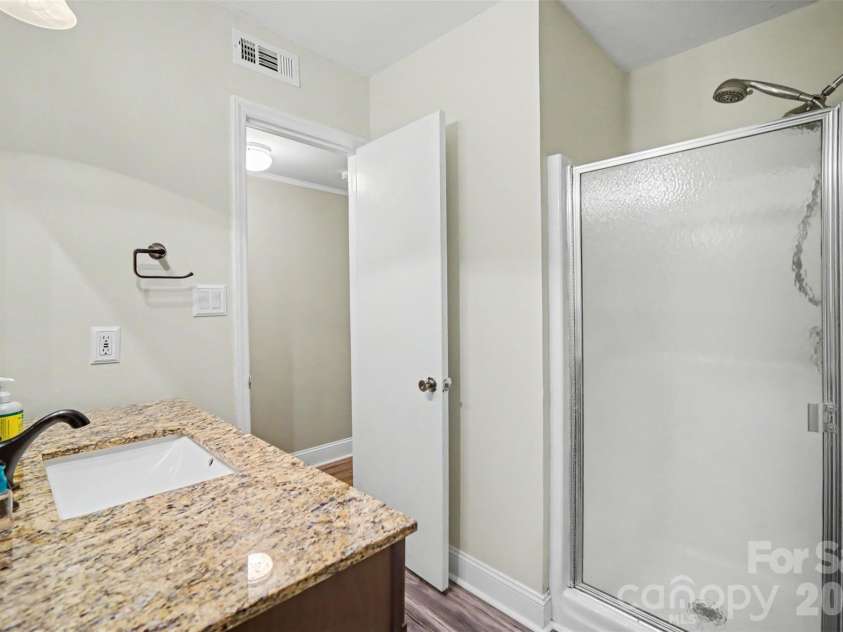 8644 Kirchenbaum Drive, Charlotte, NC 28210.  MLS# CAR4386953, YatesRealty ID 28937. First Floor Bathroom