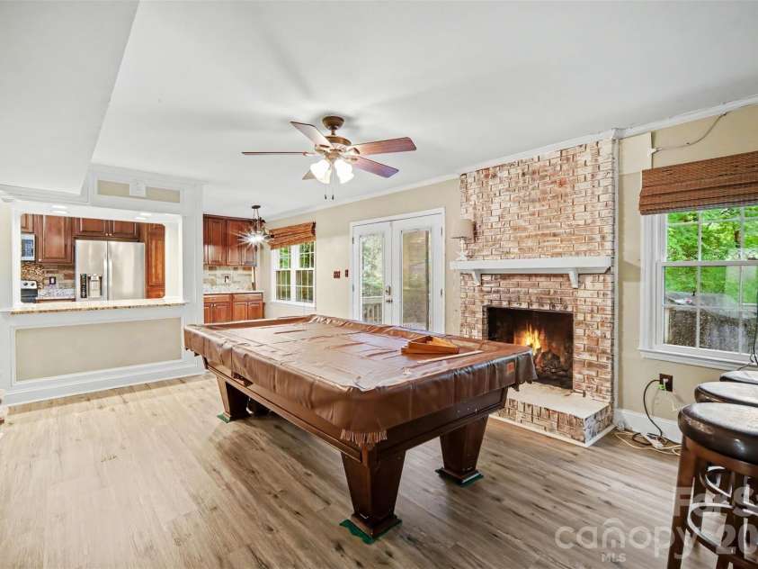 8644 Kirchenbaum Drive, Charlotte, NC 28210.  MLS# CAR4386953, YatesRealty ID 28937. Great Room Opens onto Back Deck