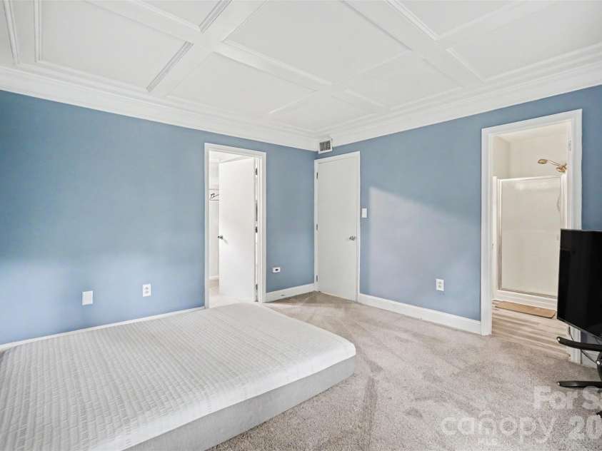 8644 Kirchenbaum Drive, Charlotte, NC 28210.  MLS# CAR4386953, YatesRealty ID 28937. Primary Bedroom with Elegant Coffered Ceiling