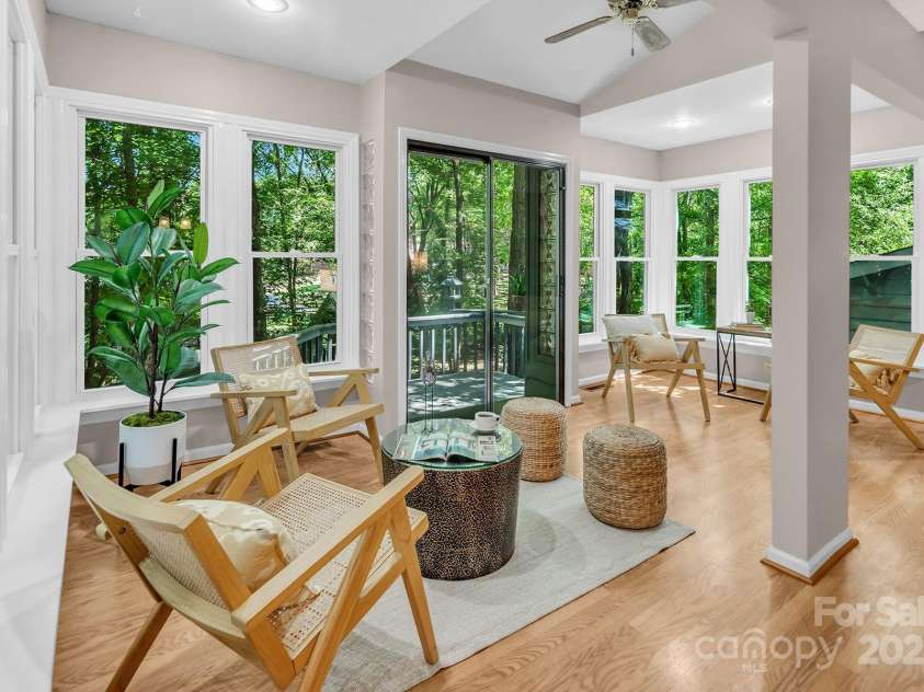 7608 Zermatt Lane, Charlotte, NC 28226.  MLS# CAR4283593, YatesRealty ID 28938. Sunroom w windows on every side bring warmth and sunlight into the home