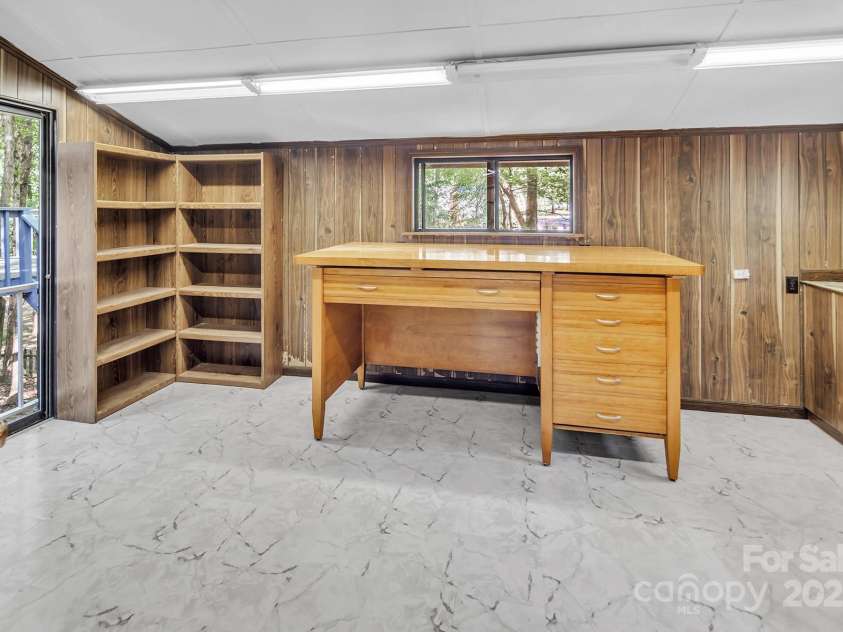 7608 Zermatt Lane, Charlotte, NC 28226.  MLS# CAR4283593, YatesRealty ID 28938. Unheated drafted room off back of garage