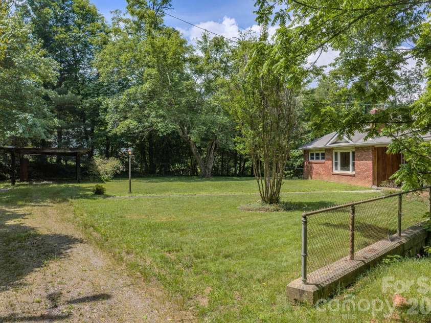 456 Lower Grassy Branch Road, Asheville, NC 28805.  MLS# CAR4387349, YatesRealty ID 28939. Flat yard
