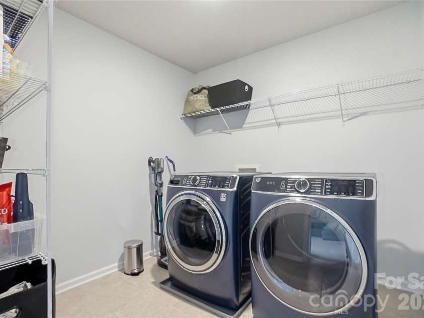 16009 Duval Drive, Charlotte, NC 28273.  MLS# CAR4387647, YatesRealty ID 28943. Large Laundry Room - 2nd Floor