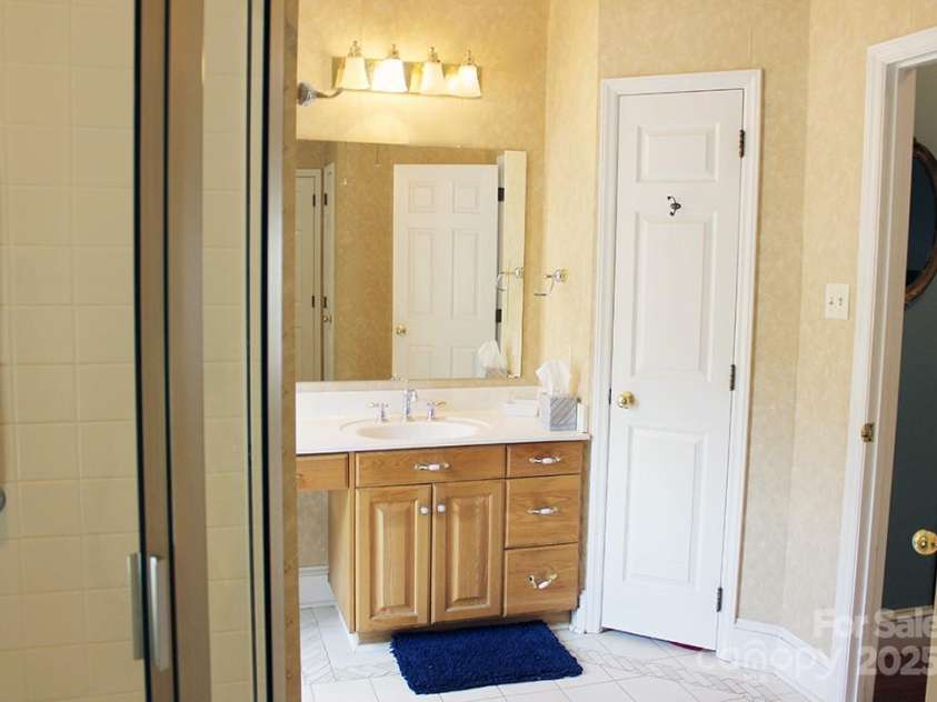 2085 Cavendale Drive, Rock Hill, SC 29732.  MLS# CAR4279302, YatesRealty ID 28945. Dual sinks and custom tiled flooring