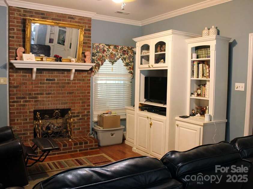 2085 Cavendale Drive, Rock Hill, SC 29732.  MLS# CAR4279302, YatesRealty ID 28945. Fireplace in family room
