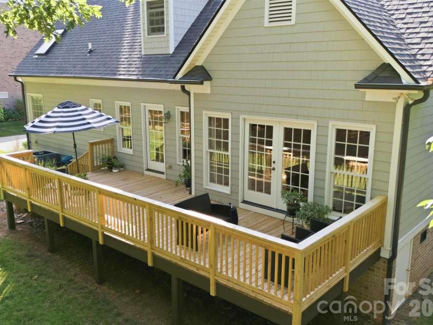 2925 Arbor Knoll, Concord, NC 28025.  MLS# CAR4380633, YatesRealty ID 28948. Expansive entertaining deck