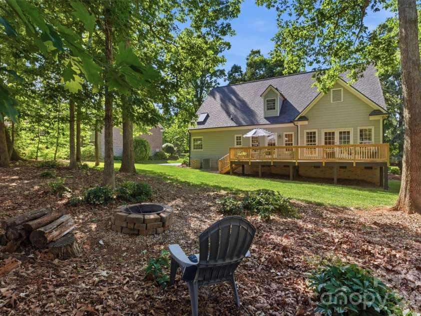 2925 Arbor Knoll, Concord, NC 28025.  MLS# CAR4380633, YatesRealty ID 28948. Large private backyard with fire pit