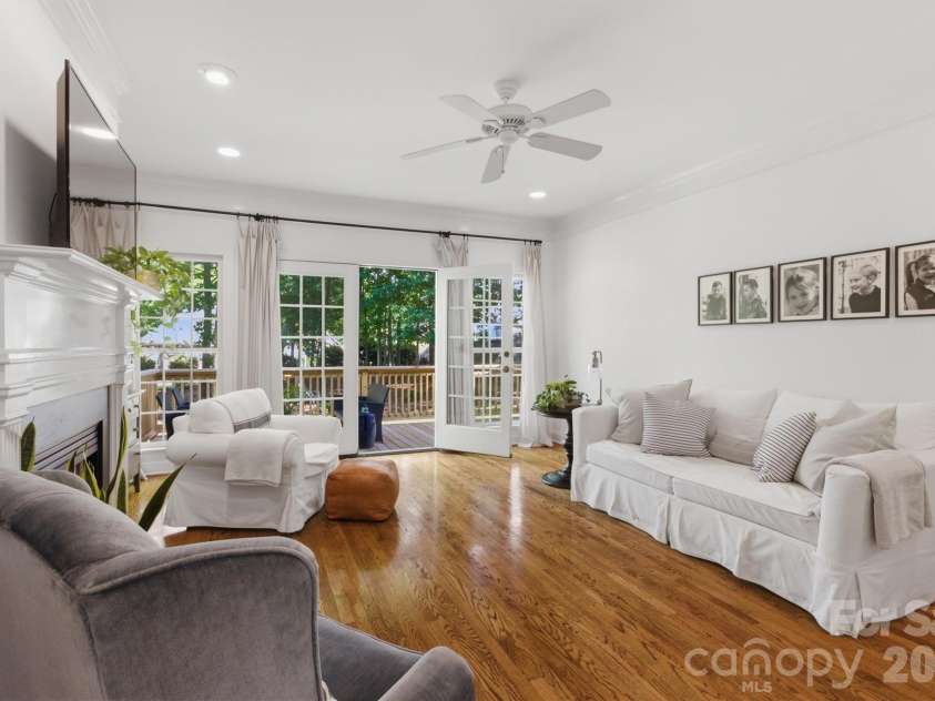 2925 Arbor Knoll, Concord, NC 28025.  MLS# CAR4380633, YatesRealty ID 28948. Living room opens to back deck