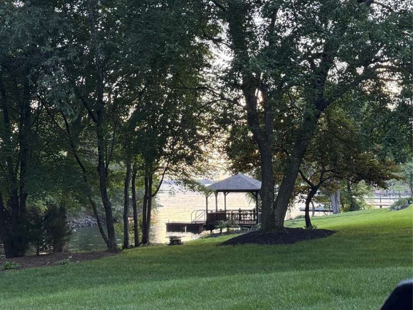 18733 Bluff Point Road, Cornelius, NC 28031.  MLS# CAR4267199, YatesRealty ID 28952. Coming home to Bluff Point Road provides daily water views and the best winter sunsets