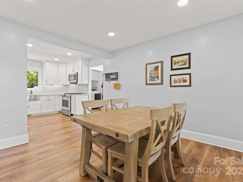 18733 Bluff Point Road, Cornelius, NC 28031.  MLS# CAR4267199, YatesRealty ID 28952. Recently opened wall from kitchen to dining