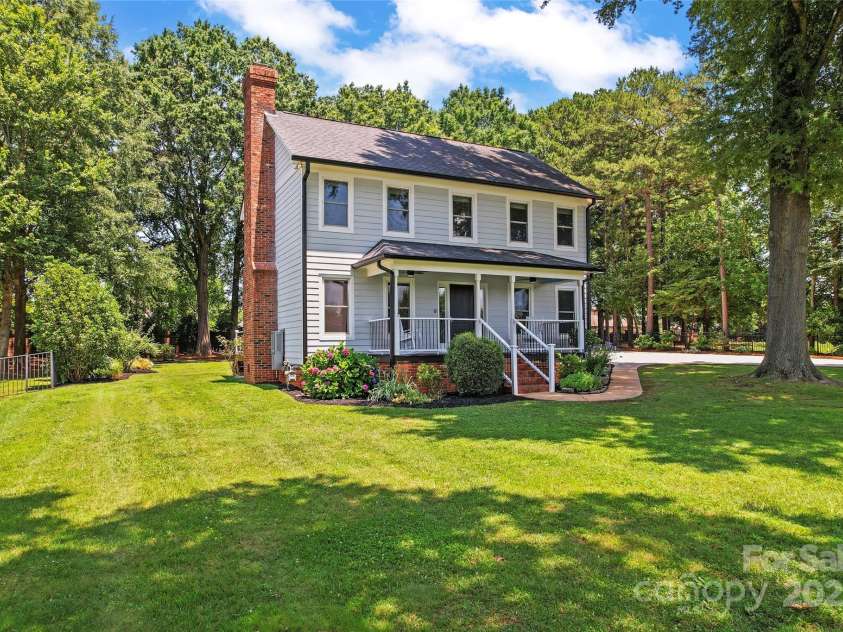 18733 Bluff Point Road, Cornelius, NC 28031.  MLS# CAR4267199, YatesRealty ID 28952. Recently replaced to Hardi siding and new gutters