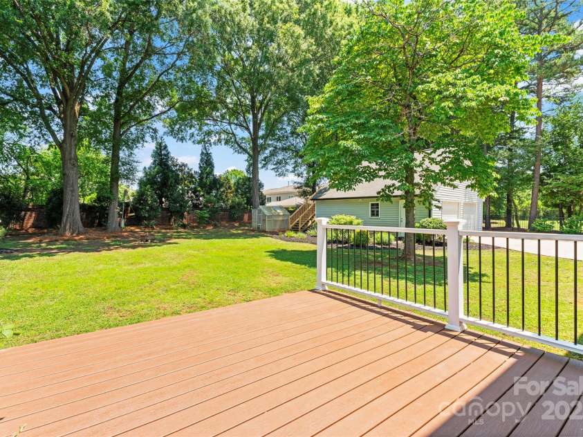 18733 Bluff Point Road, Cornelius, NC 28031.  MLS# CAR4267199, YatesRealty ID 28952. Trex deck for back yard enjoyment