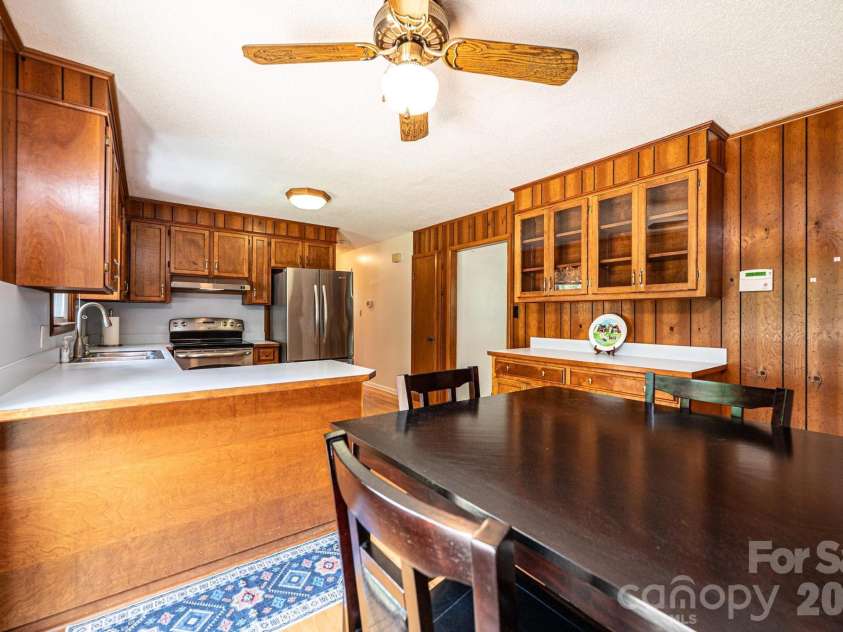 315 Shannonbrook Drive, Newton, NC 28658.  MLS# CAR4388332, YatesRealty ID 28952. Dining into Kitchen