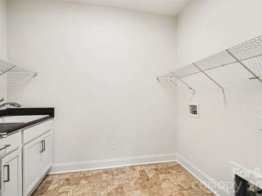 1119 Millview Lane, Matthews, NC 28104.  MLS# CAR4389406, YatesRealty ID 28954. Laundry Room with sink